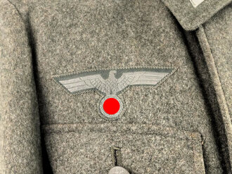 Kavallerie, Feldbluse für Mannschaften Modell 1943. Kammerstück in sehr gutem Zustand, der Brustadler neuzeitlich vernäht