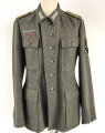 Kavallerie, Feldbluse für Mannschaften Modell 1943. Kammerstück in sehr gutem Zustand, der Brustadler neuzeitlich vernäht