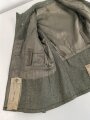 Kavallerie, Feldbluse für Mannschaften Modell 1943. Kammerstück in sehr gutem Zustand, der Brustadler neuzeitlich vernäht