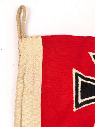 Kriegsmarine, Reichskriegsflagge in der kleinen Ausführung für U-Boote. Markiert " Kr. Fl. 50 x 85" sowie unleserlicher Herstellerstempel. Guter Zustand