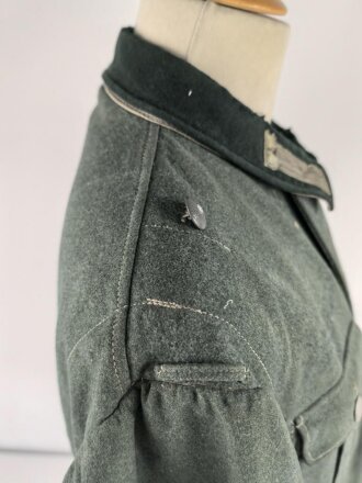 Feldbluse Modell 1935 für Mannschaften des Heeres. Stark getragenes Kammerstück, selten