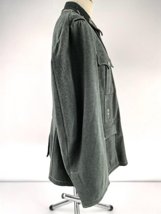 Feldbluse Modell 1935 für Mannschaften des Heeres. Stark getragenes Kammerstück, selten