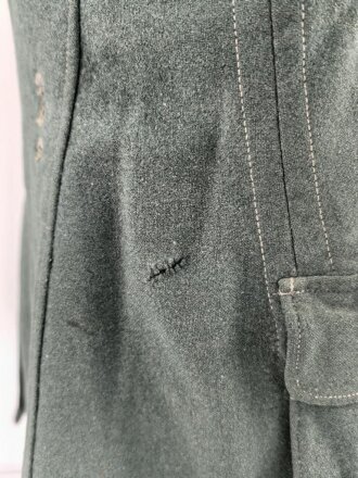 Feldbluse Modell 1935 für Mannschaften des Heeres. Stark getragenes Kammerstück, selten
