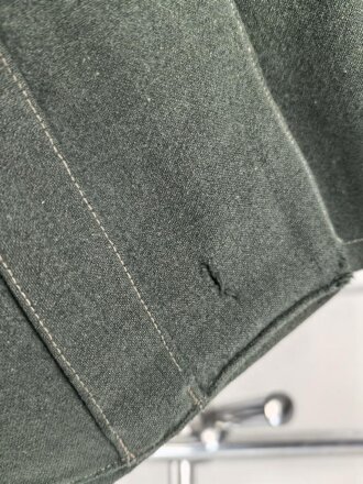 Feldbluse Modell 1935 für Mannschaften des Heeres. Stark getragenes Kammerstück, selten