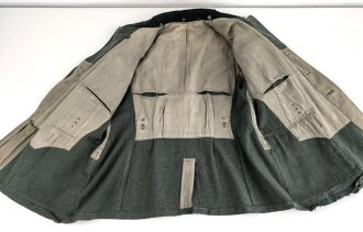 Feldbluse Modell 1935 für Mannschaften des Heeres. Stark getragenes Kammerstück, selten