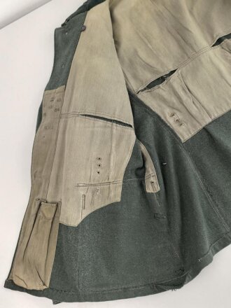 Feldbluse Modell 1935 für Mannschaften des Heeres. Stark getragenes Kammerstück, selten