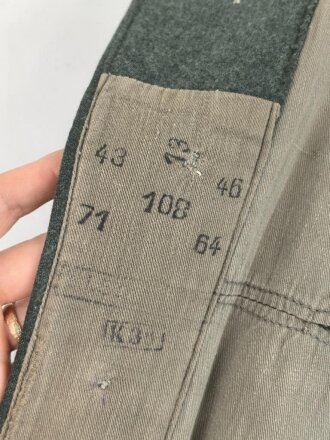 Feldbluse Modell 1935 für Mannschaften des Heeres. Stark getragenes Kammerstück, selten