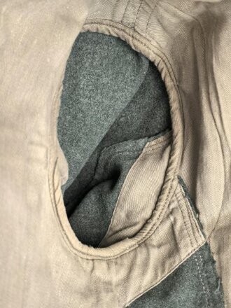 Feldbluse Modell 1935 für Mannschaften des Heeres. Stark getragenes Kammerstück, selten