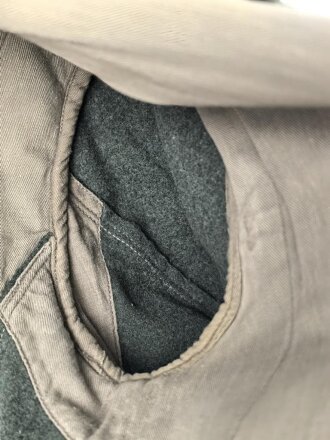 Feldbluse Modell 1935 für Mannschaften des Heeres. Stark getragenes Kammerstück, selten