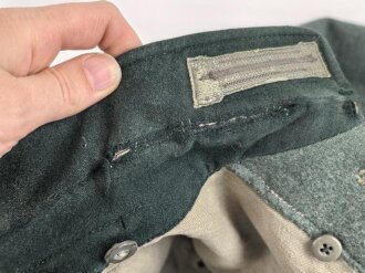 Feldbluse Modell 1935 für Mannschaften des Heeres. Stark getragenes Kammerstück, selten