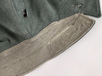 Feldbluse Modell 1935 für Mannschaften des Heeres. Stark getragenes Kammerstück, selten