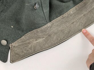 Feldbluse Modell 1935 für Mannschaften des Heeres. Stark getragenes Kammerstück, selten