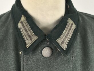Feldbluse Modell 1935 für Mannschaften des Heeres. Stark getragenes Kammerstück, selten