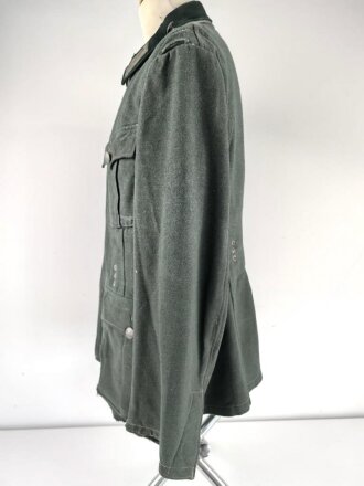 Feldbluse Modell 1935 für Mannschaften des Heeres. Stark getragenes Kammerstück, selten