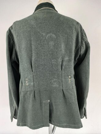 Feldbluse Modell 1935 für Mannschaften des Heeres. Stark getragenes Kammerstück, selten