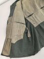 Feldbluse Modell 1935 für Mannschaften des Heeres. Stark getragenes Kammerstück, selten