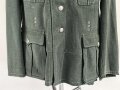 Feldbluse Modell 1935 für Mannschaften des Heeres. Stark getragenes Kammerstück, selten