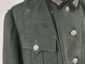 Feldbluse Modell 1935 für Mannschaften des Heeres. Stark getragenes Kammerstück, selten