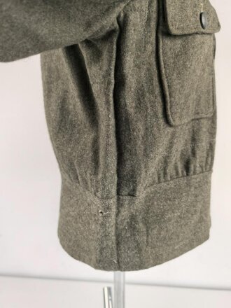 Heer, Feldbluse Modell 1944 für Mannschaften. Kammerstück in sehr gutem Zustand