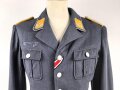 Luftwaffe, Waffenrock für einen Leutnant fliegenes Personal. Eigentumstsück mit Schneideretikett aus München