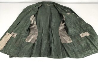 Heer, Feldbluse Modell 1943 für Mannschaften. Ausführung in Drillichmaterial, Kammerstück in sehr gutem Zustand, der Adler nachträglich vernäht