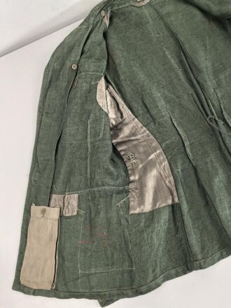 Heer, Feldbluse Modell 1943 für Mannschaften. Ausführung in Drillichmaterial, Kammerstück in sehr gutem Zustand, der Adler nachträglich vernäht