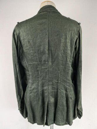 Heer, Feldbluse Modell 1943 für Mannschaften. Ausführung in Drillichmaterial, Kammerstück in sehr gutem Zustand, der Adler nachträglich vernäht