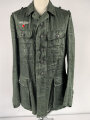 Heer, Feldbluse Modell 1943 für Mannschaften. Ausführung in Drillichmaterial, Kammerstück in sehr gutem Zustand, der Adler nachträglich vernäht