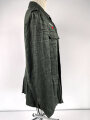 Heer, Feldbluse Modell 1943 für Mannschaften. Ausführung in Drillichmaterial, Kammerstück in sehr gutem Zustand, der Adler nachträglich vernäht