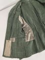Heer, Feldbluse Modell 1943 für Mannschaften. Ausführung in Drillichmaterial, Kammerstück in sehr gutem Zustand, der Adler nachträglich vernäht