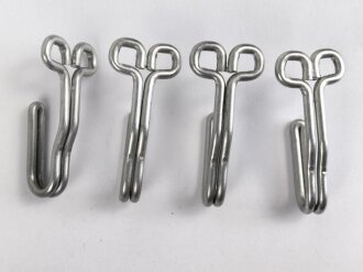 Vier Koppelhaken für eine Feldbluse der Wehrmacht, Aluminium