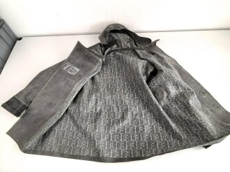 Schwerer Gasschutzanzug , Jacke und Hose aus weichem Gummi, jeweils Grösse 2. Hersteller Auer 1940. Jeweils ungereinigt