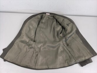 DDR, Uniformjacke eines Angehörigen im Wachregiment Felix Dzierzynski. Ungetragenes Stück, datiert 1988