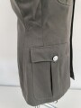 DDR, Uniformjacke eines Angehörigen im Wachregiment Felix Dzierzynski. Ungetragenes Stück, datiert 1988