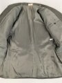 DDR, Uniformjacke und Hose eines Angehörigen im Wachregiment „Feliks Dzierzynski“ Die Jaxcke datiert 1975, guter Gesamtzustand