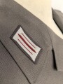 DDR, Uniformjacke und Hose eines Angehörigen im Wachregiment „Feliks Dzierzynski“ Die Jaxcke datiert 1975, guter Gesamtzustand