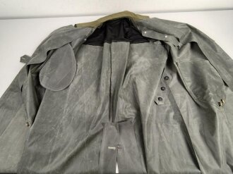 Moderner " Kradmantel" aus weichem Gummi, im Schnitt ähnlich dem Modell der Wehrmacht. Guter Zustand