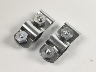 Paar Halterungen für Fahrzeugstander. Ungebraucht, Alter unbekannt. Maße 15 x 36mm. Sie erhalten ein Paar ( 2 Stück )