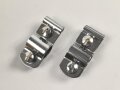 Paar Halterungen für Fahrzeugstander. Ungebraucht, Alter unbekannt. Maße 15 x 36mm. Sie erhalten ein Paar ( 2 Stück )