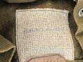 Rucksack , vermutlich direkt nach dem Krieg aus Resten der Rüstungsindustrie zusammengebaut. Die Enden der Trageriemen aus Ersatzmaterial, an einem fehlt ein Verbindungsstück