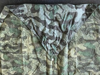 Zeltbahn 31 Wehrmacht. Getragenes, farbfrisches Stück in gutem Gesamtzustand, mit Reichsbetriebsnummer