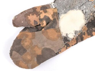 Einzelner Winterhandschuh für Angehörige der Waffen SS . Getragenes Stück, defekt