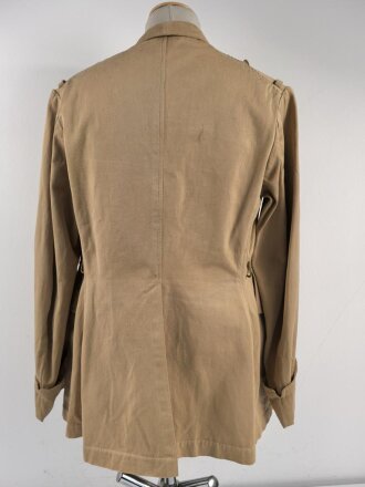 Tropenfeldbluse im Stil der Luftwaffe. Vermutlich ursprünglich Französisch ? , mit deutscher Stempelung versehen