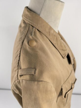 Tropenfeldbluse im Stil der Luftwaffe. Vermutlich ursprünglich Französisch ? , mit deutscher Stempelung versehen