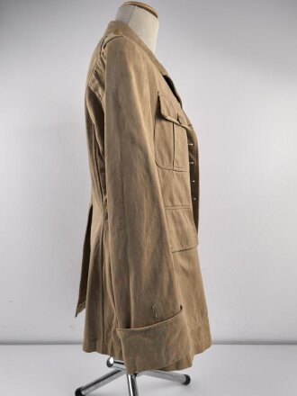 Tropenfeldbluse im Stil der Luftwaffe. Vermutlich ursprünglich Französisch ? , mit deutscher Stempelung versehen