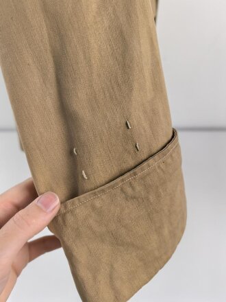 Tropenfeldbluse im Stil der Luftwaffe. Vermutlich ursprünglich Französisch ? , mit deutscher Stempelung versehen