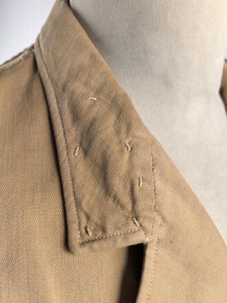 Tropenfeldbluse im Stil der Luftwaffe. Vermutlich ursprünglich Französisch ? , mit deutscher Stempelung versehen