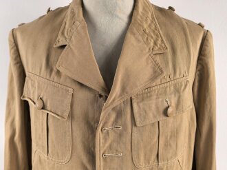 Tropenfeldbluse im Stil der Luftwaffe. Vermutlich ursprünglich Französisch ? , mit deutscher Stempelung versehen