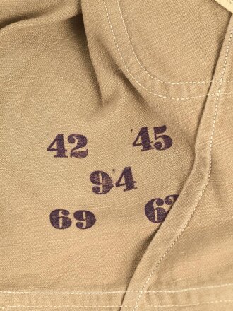 Tropenfeldbluse im Stil der Luftwaffe. Vermutlich ursprünglich Französisch ? , mit deutscher Stempelung versehen