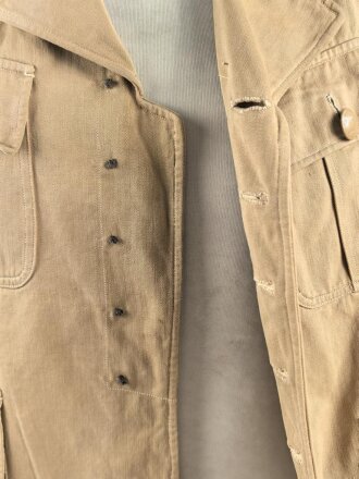 Tropenfeldbluse im Stil der Luftwaffe. Vermutlich ursprünglich Französisch ? , mit deutscher Stempelung versehen